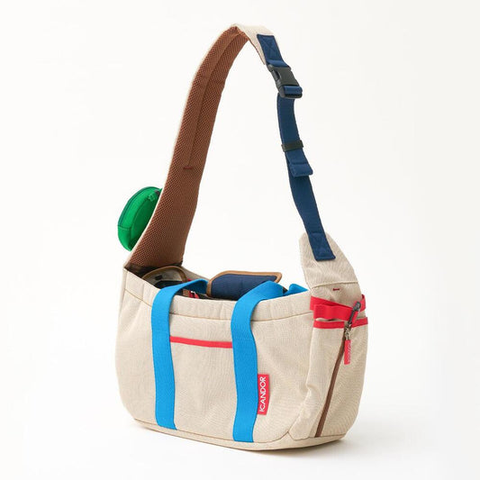 PEEK-A-BOO Pet Sling Bag (Melting Cream)